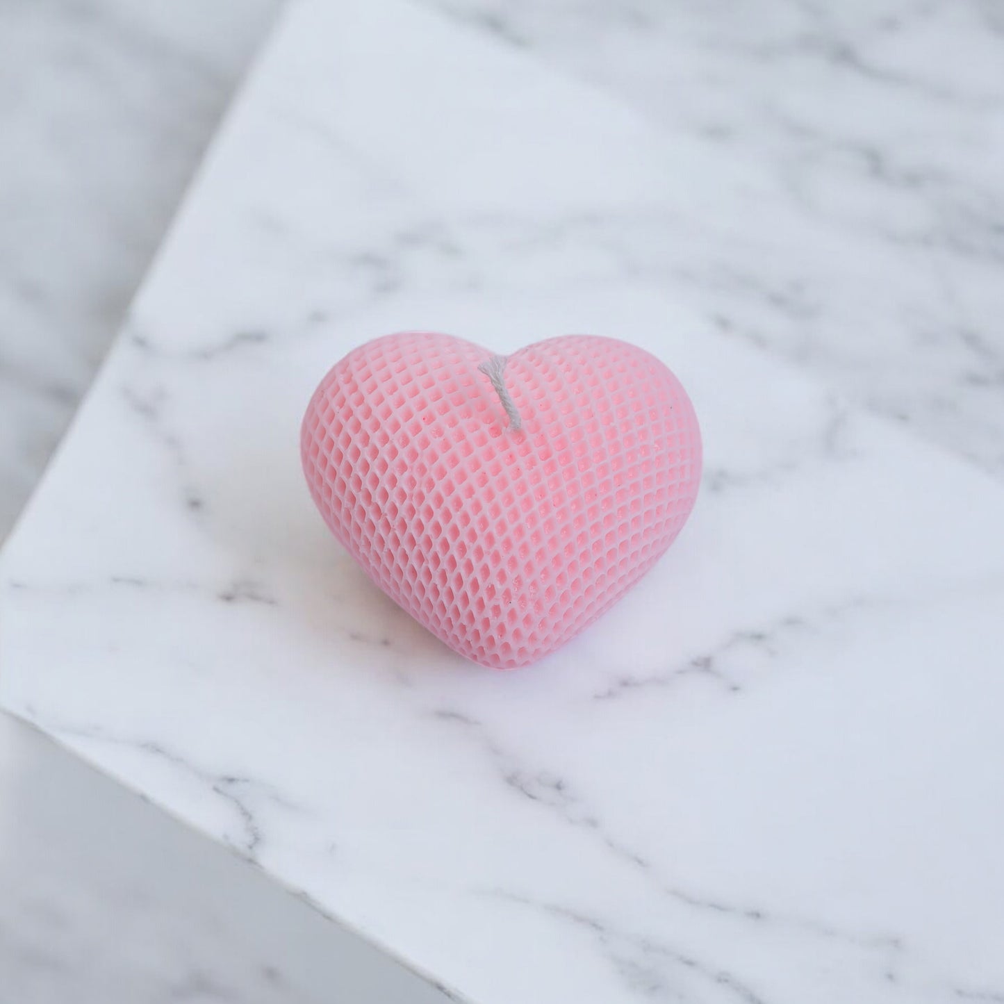 Baby pink heart shaped candle
