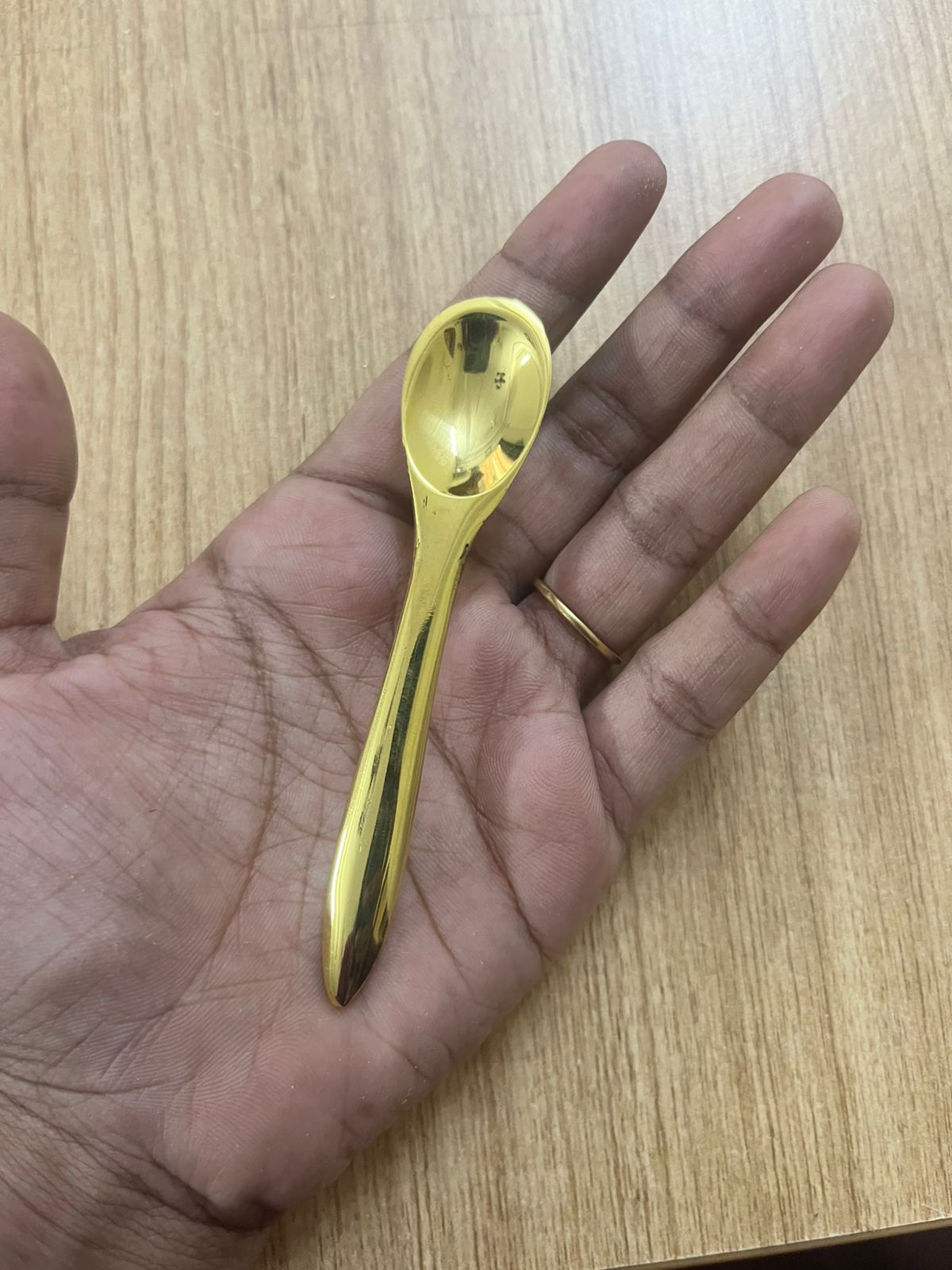 Brass spoon