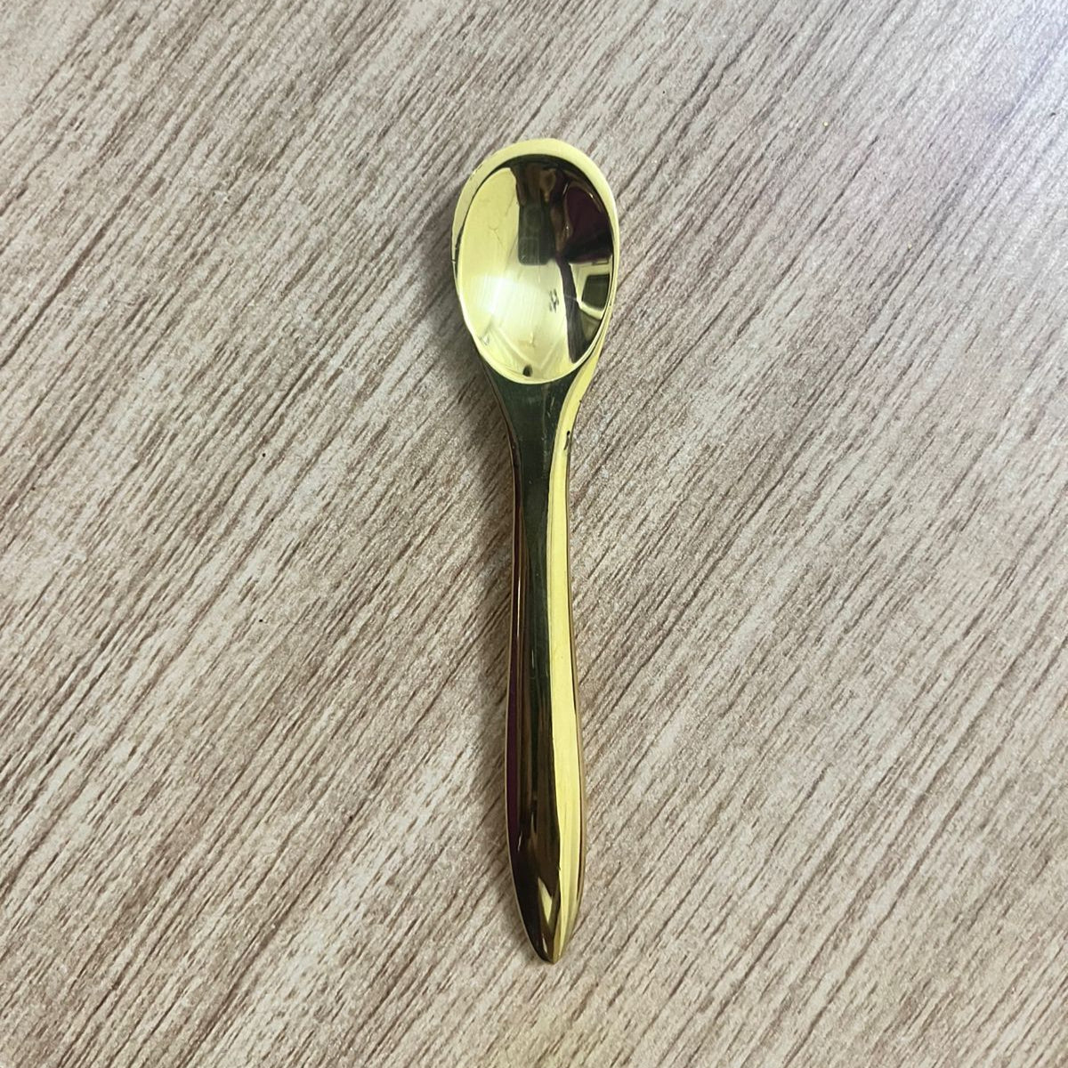 Brass spoon